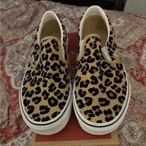 Vans classic slip ons in cheetah.